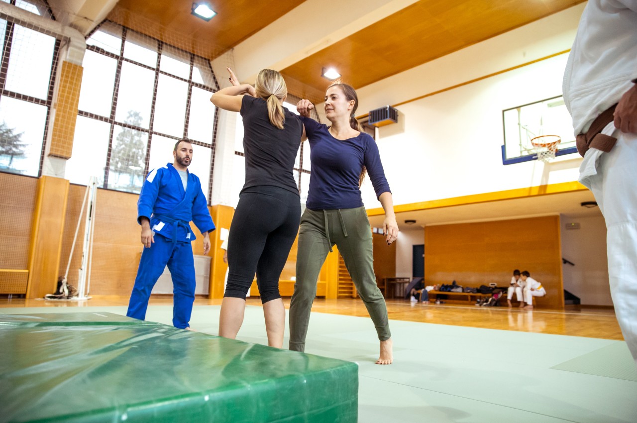 Martial arts instructor with kids