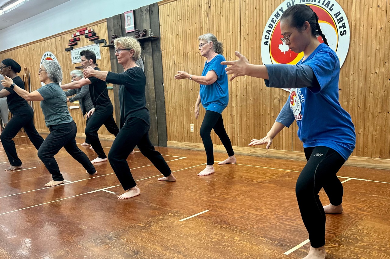 Martial arts instructor with kids