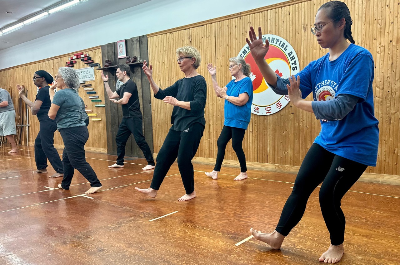 Martial arts instructor with kids