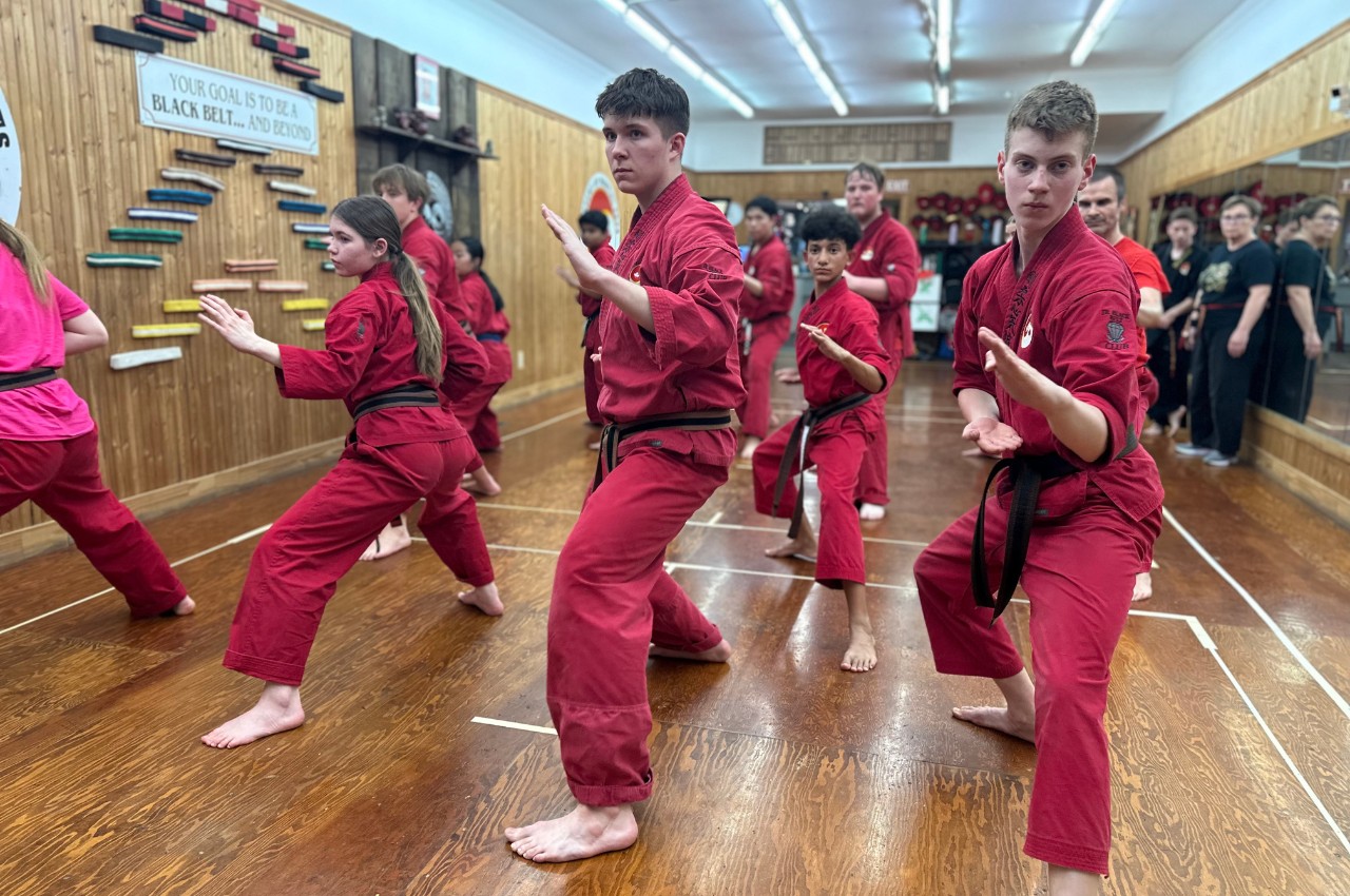 Martial arts instructor with kids