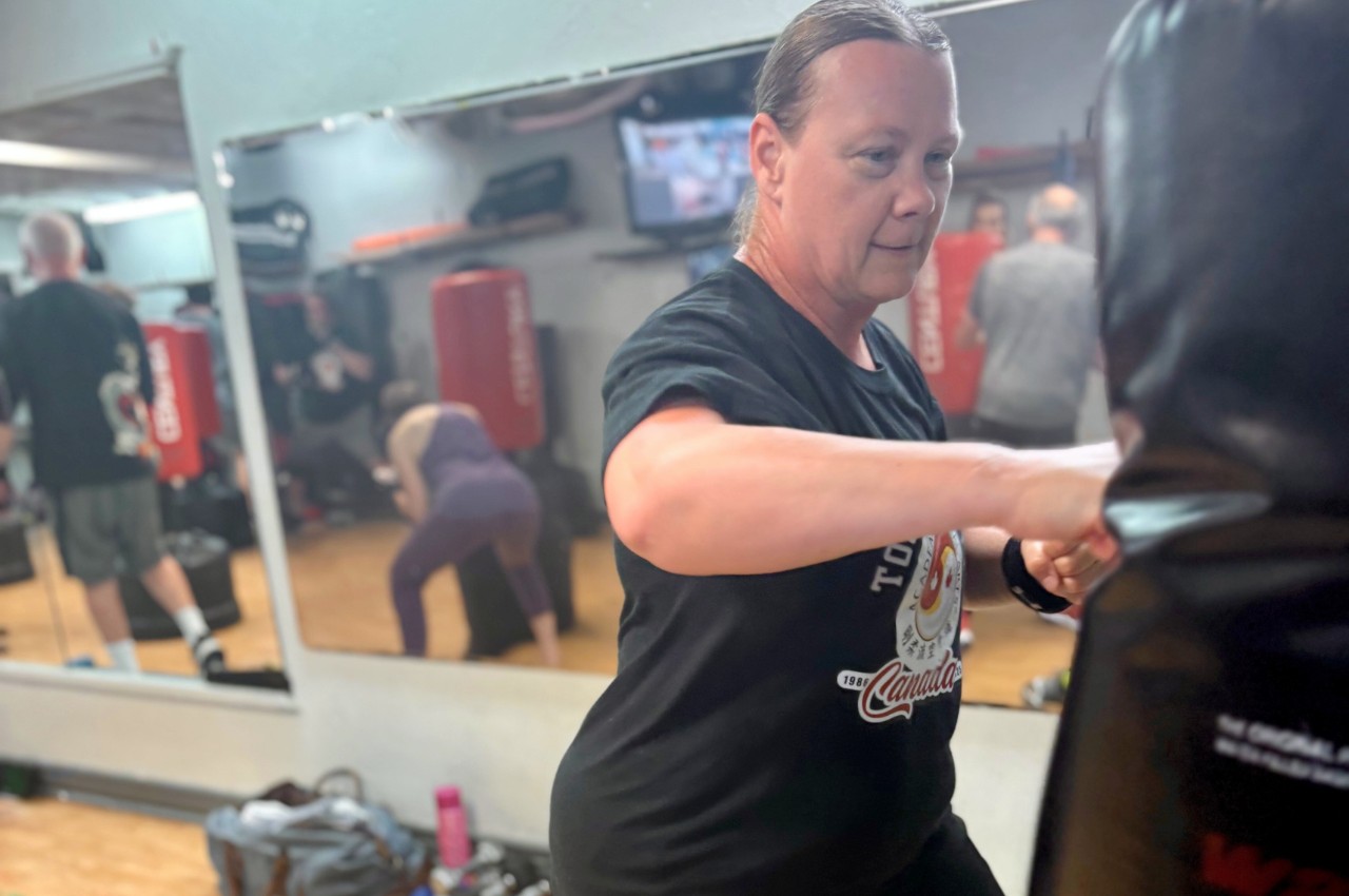 Martial arts instructor with kids