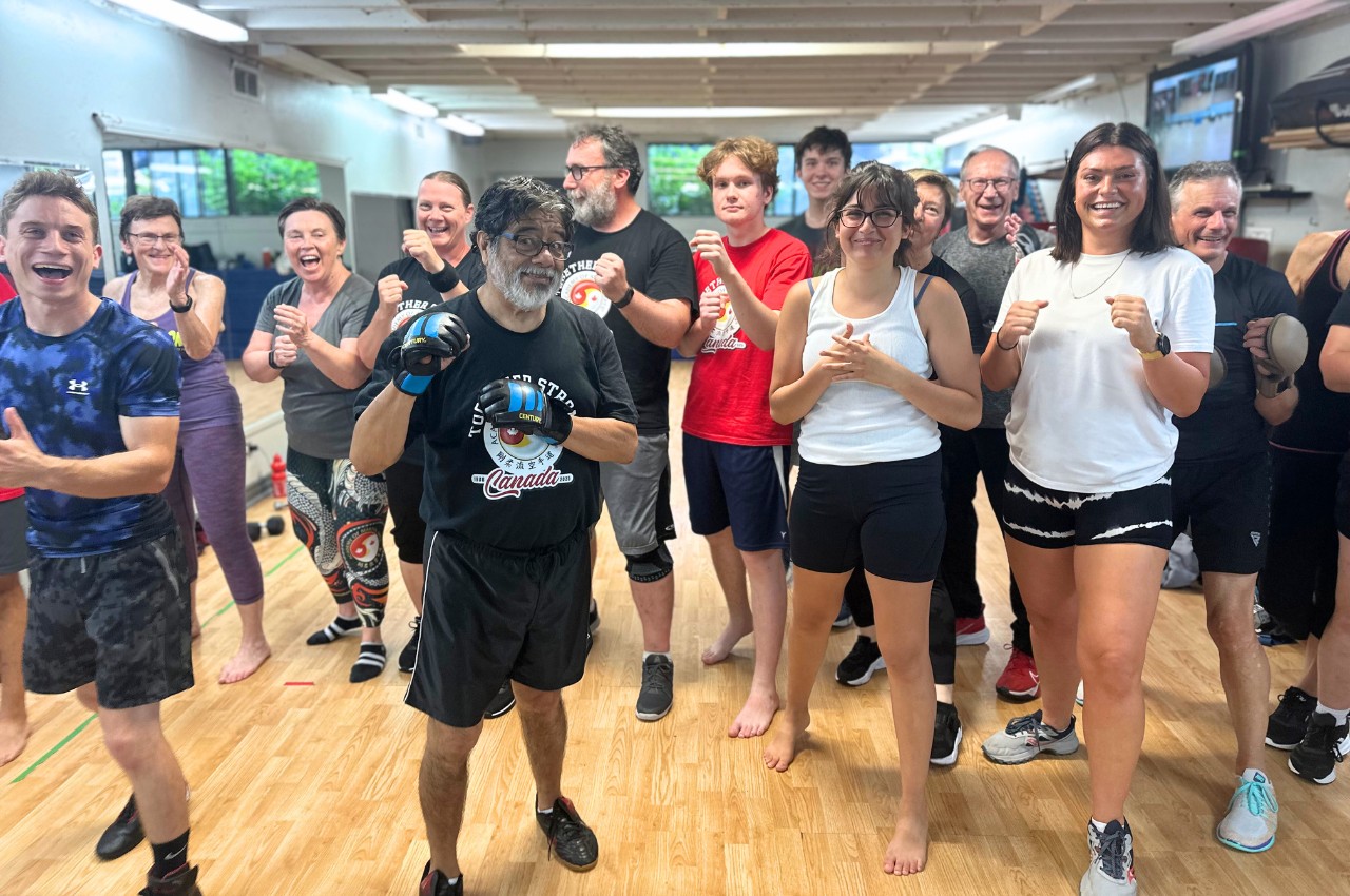 Martial arts instructor with kids