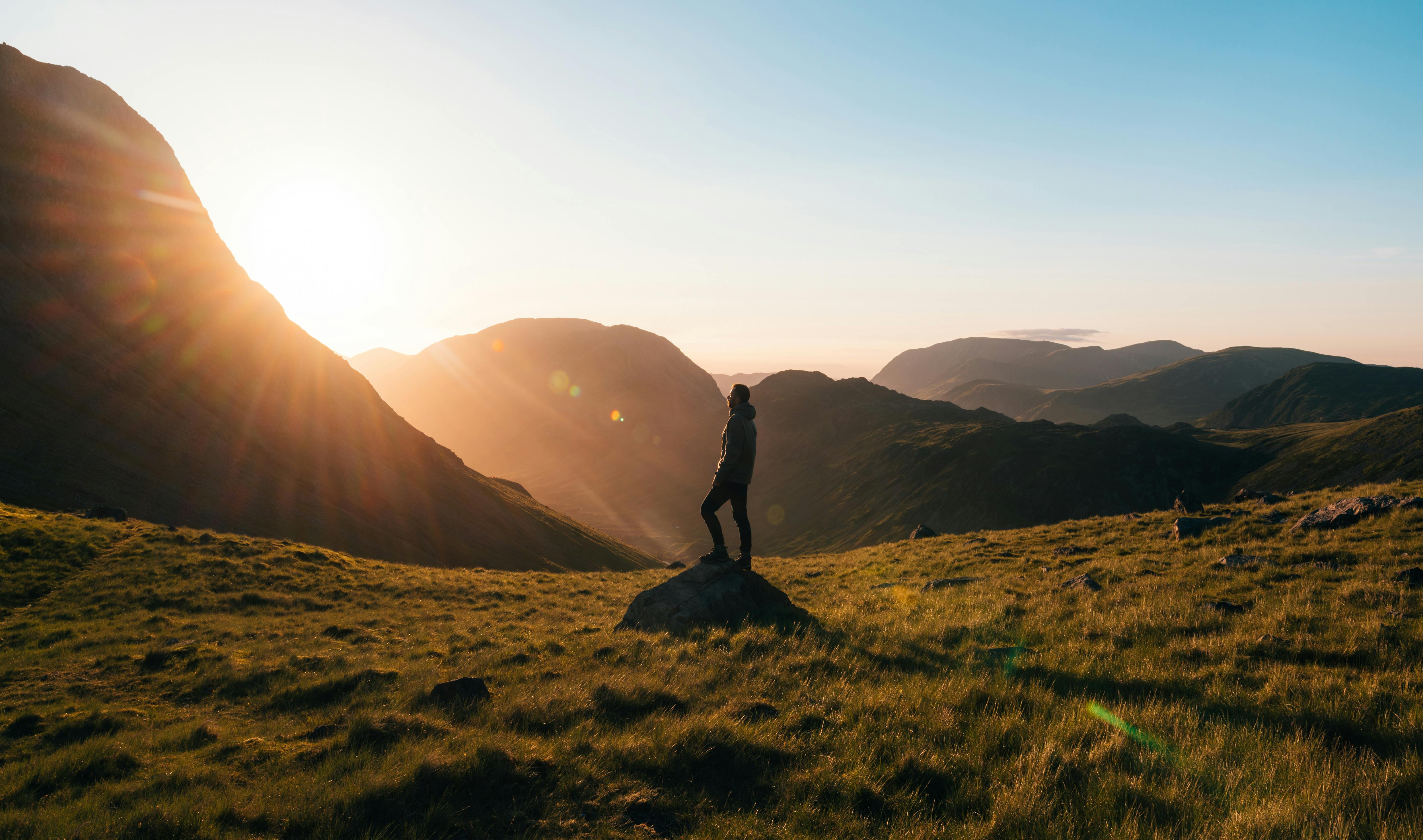 man standing in the sun