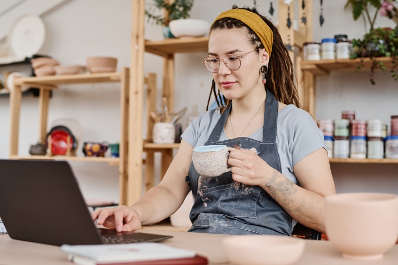 Small Business Woman Working on Computer SMBs