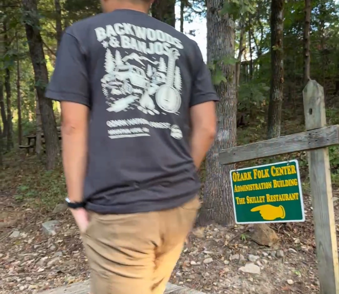 A man walking to the woods