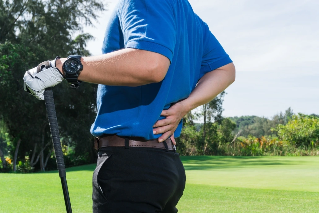 a golfer with back pain