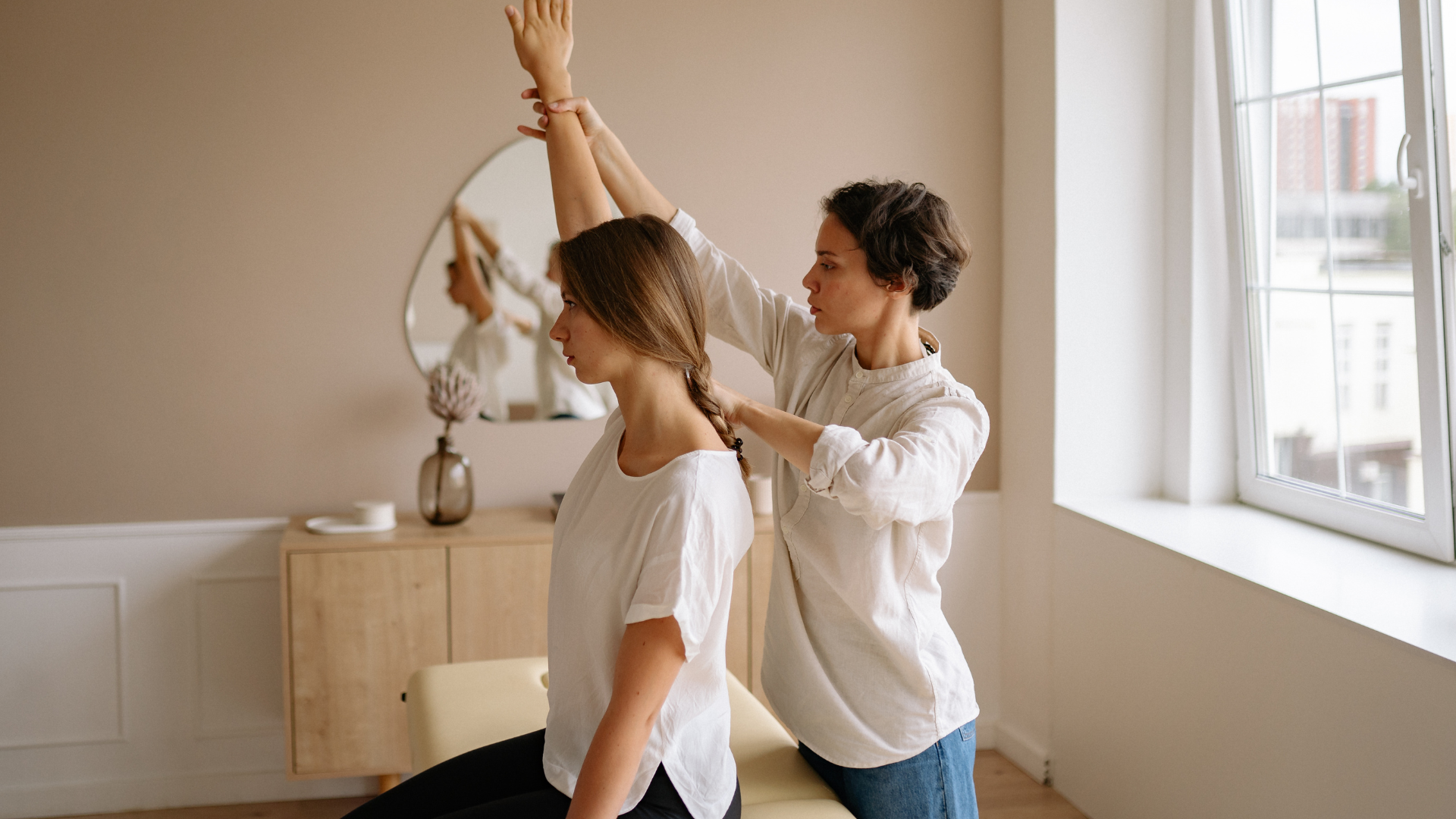 chiropractor with a patient