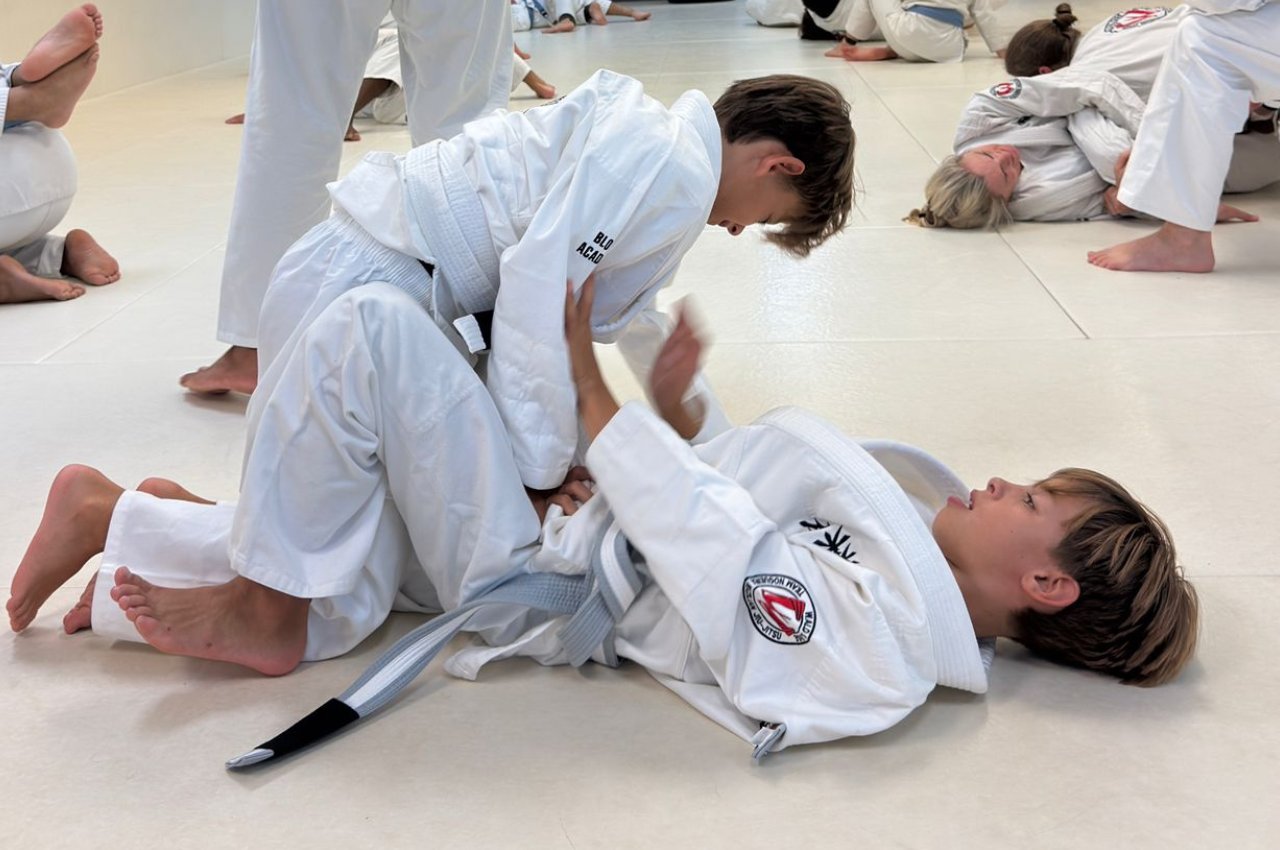 Martial arts instructor with kids