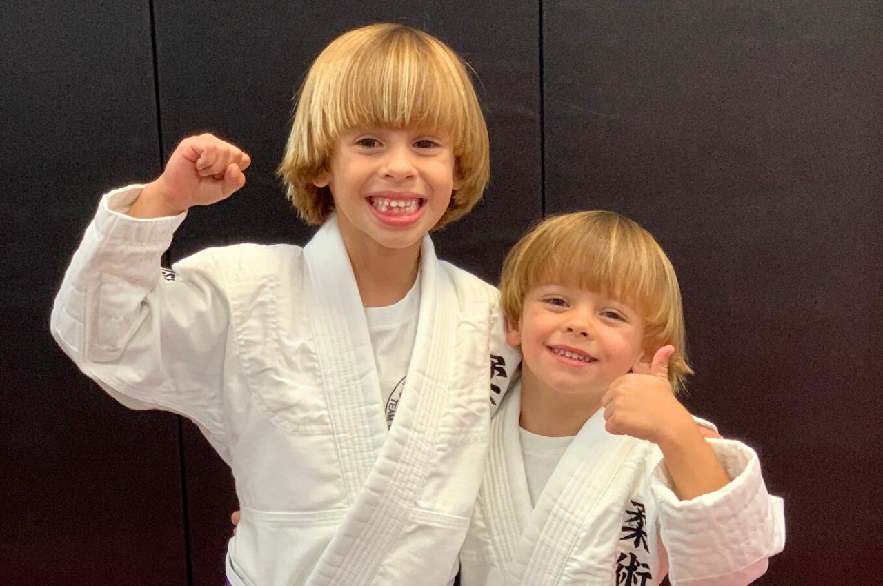 Martial arts instructor with kids