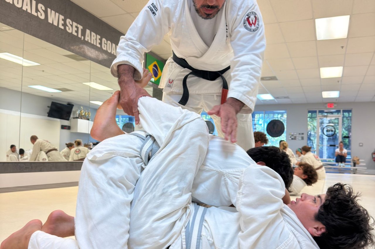 Martial arts instructor with kids