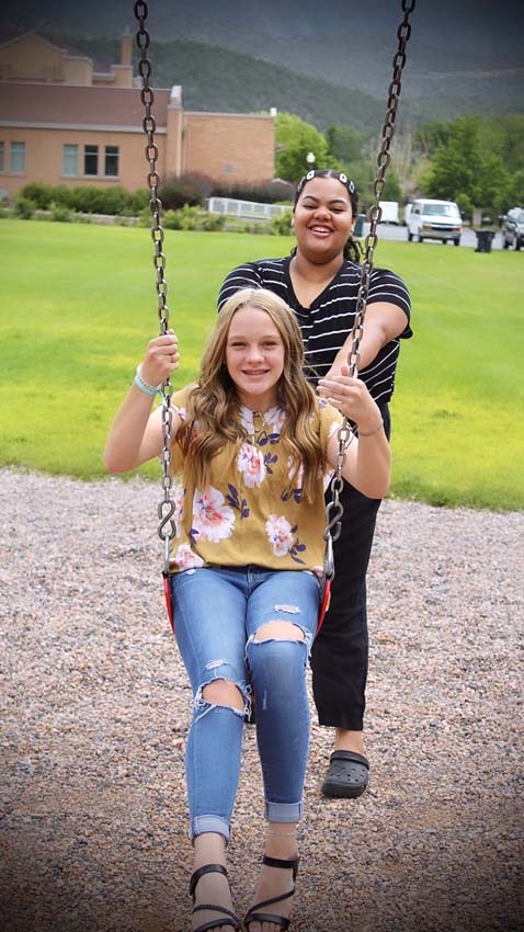 girls on swing girls on swing