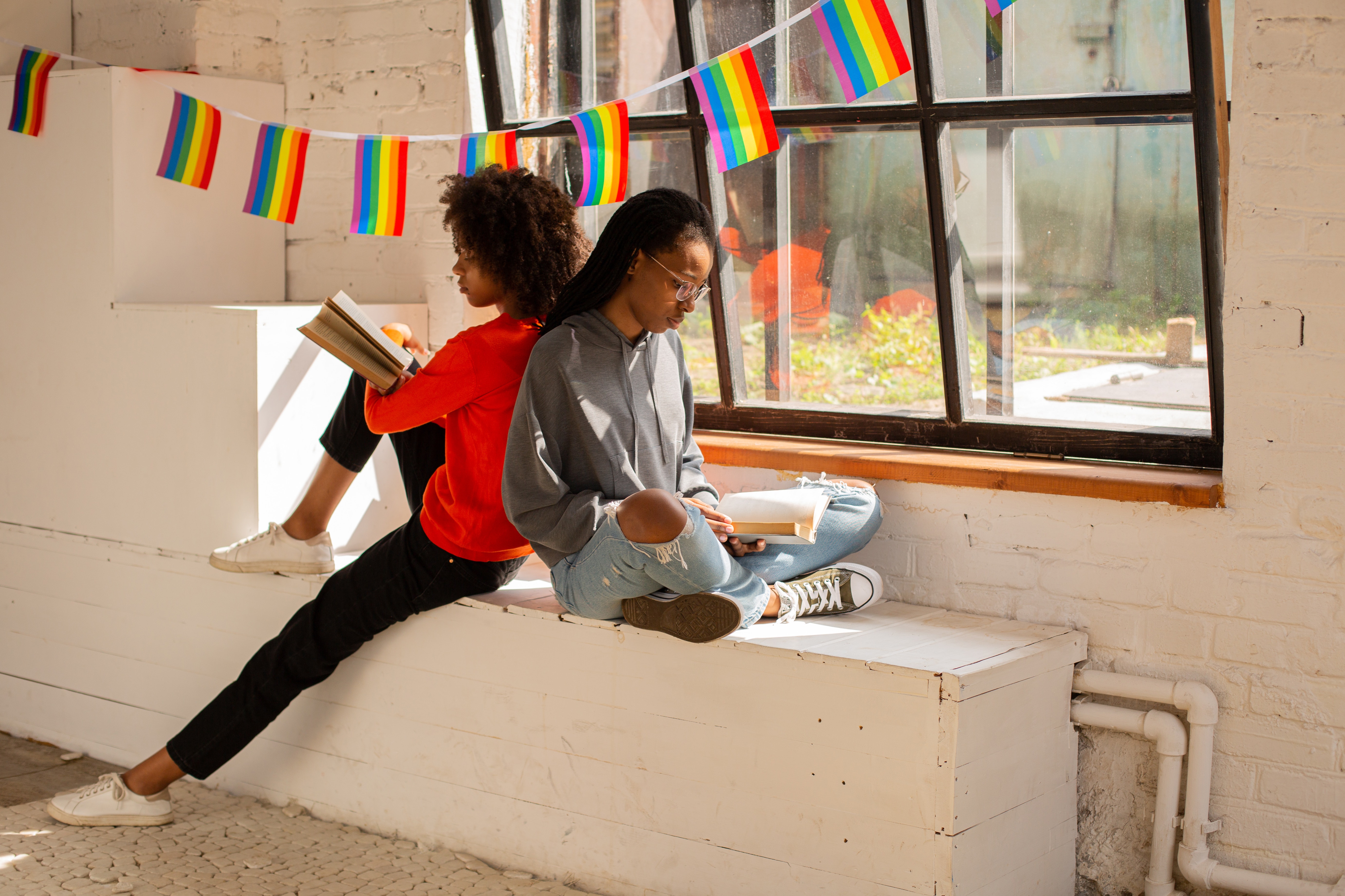 kids in window reading books