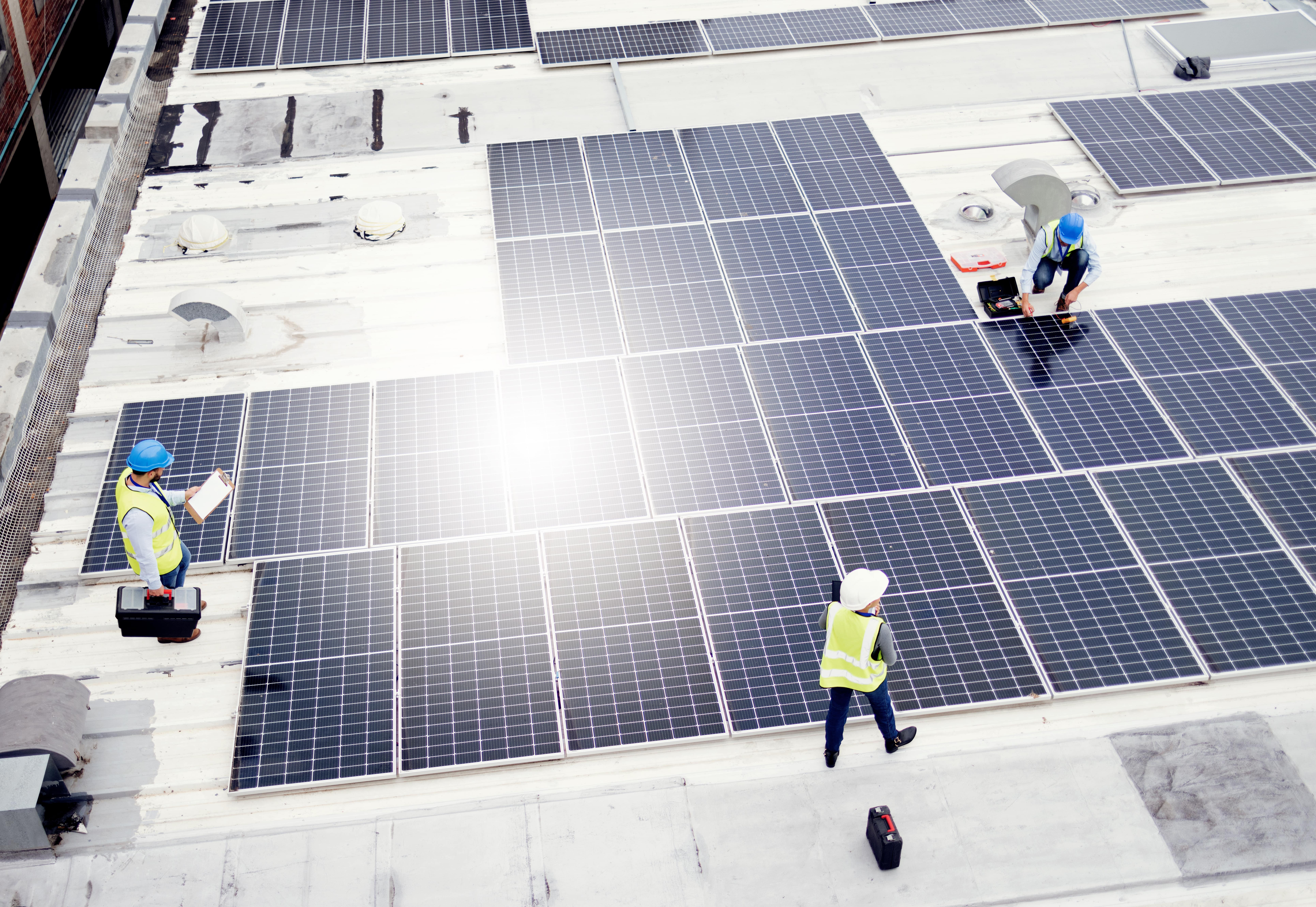 experts installing solar panels