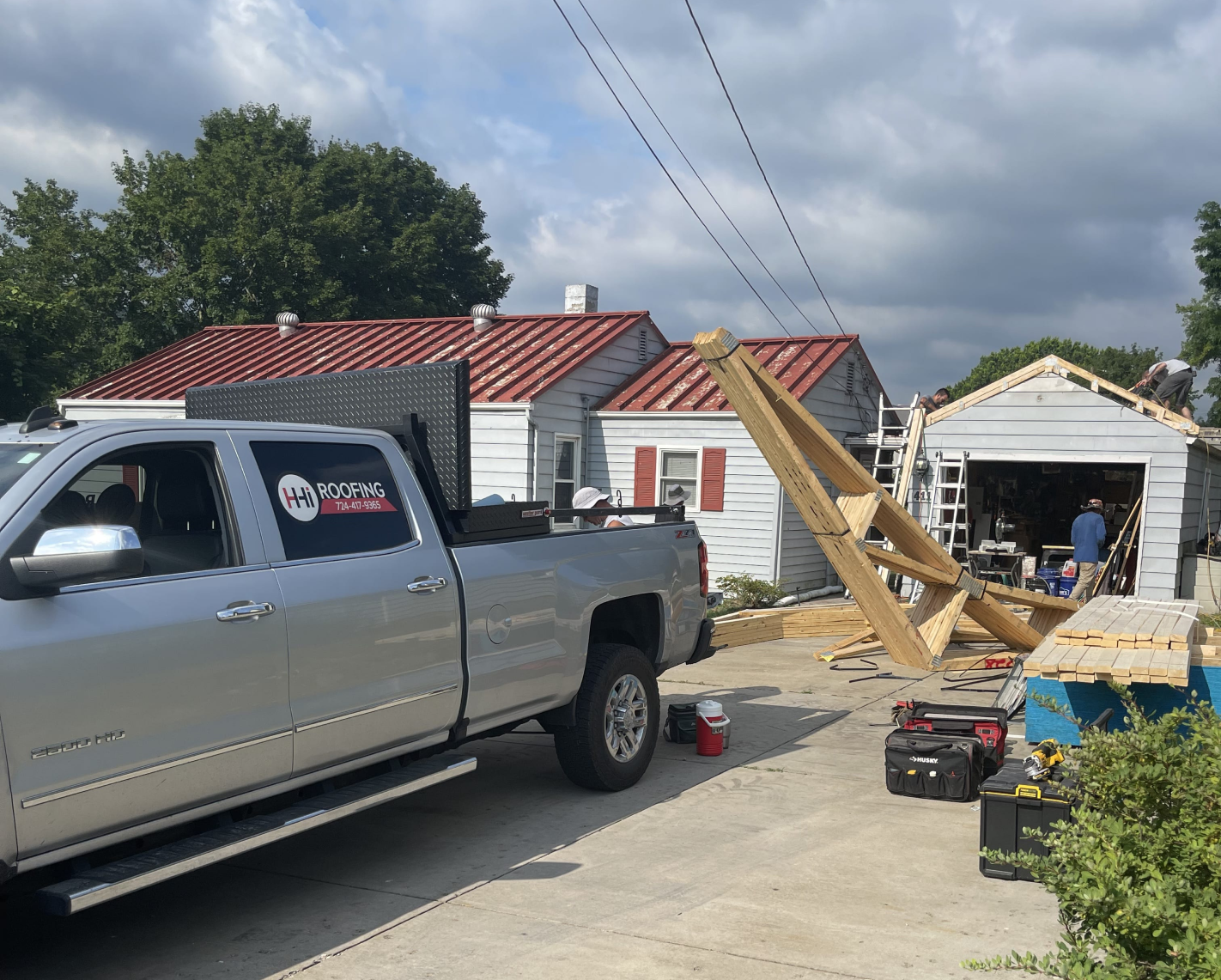 HHI Roofing owner and family smiling