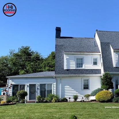 expert roofing contractor working on roof installation