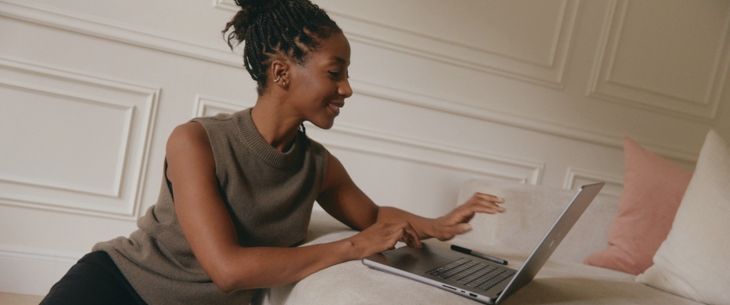 Woman real estate agent working on laptop Woman real estate agent working on laptop
