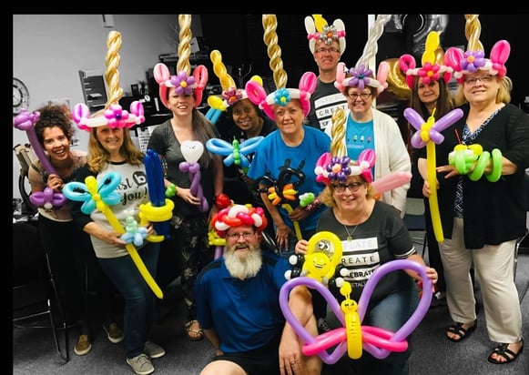 A Group happy with Balloon Twisting