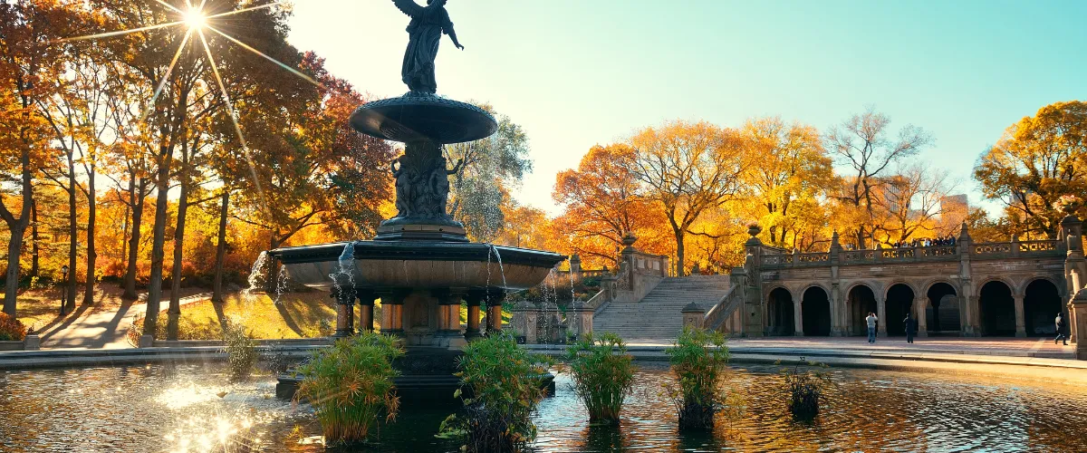 Bethesda Terrace Fountain in Central Park surrounded by spring greenery Bethesda Terrace Fountain in Central Park surrounded by spring greenery