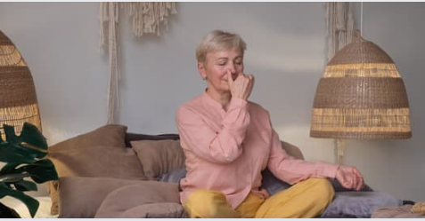 a woman meditating to relieve stress and feel better a woman meditating to relieve stress and feel better
