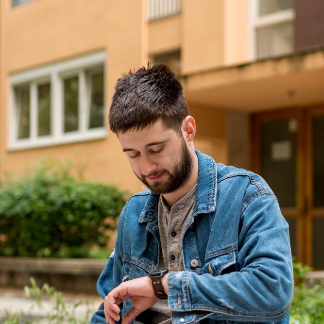 Man looking at his watch
