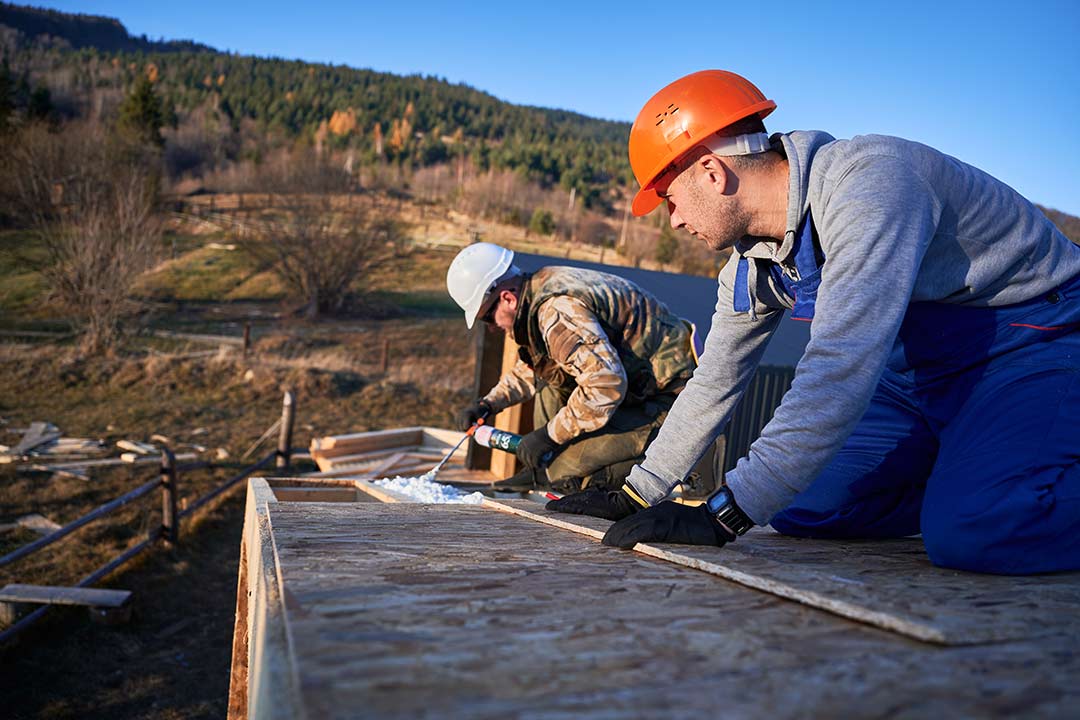 Roofing crew applying high-quality underlayment to protect the home from water damage. Roofing crew applying high-quality underlayment to protect the home from water damage.
