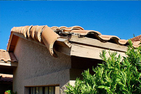 tile damage on the corner of roof tile damage on the corner of roof
