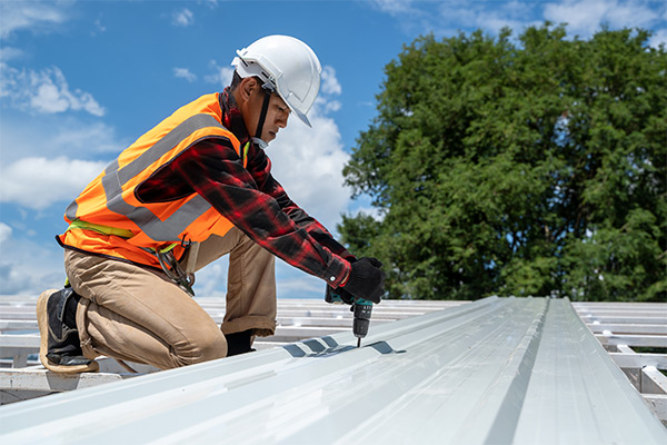 a skilled roofing contractor installing new roof a skilled roofing contractor installing new roof
