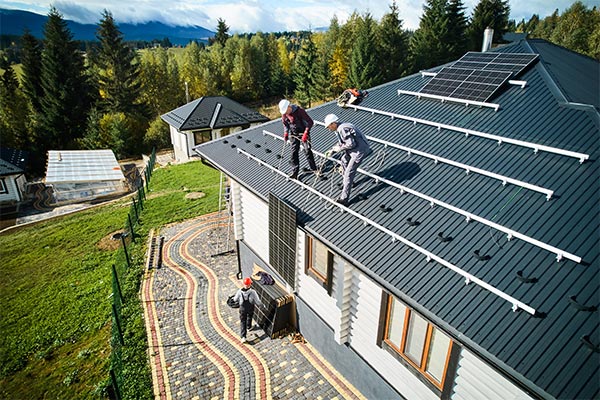 a new home installing solar roof surrounded by a green landscape a new home installing solar roof surrounded by a green landscape