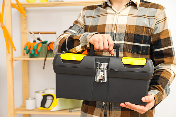 a toolbox filled with essential roofing tools a toolbox filled with essential roofing tools