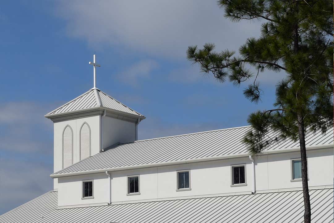 a sleek metal roof with clean lines of a church a sleek metal roof with clean lines of a church