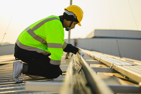a worker ensures proper functioning of roof ventilation a worker ensures proper functioning of roof ventilation