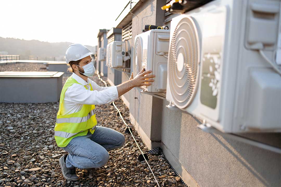 repairman checking the ventilation repairman checking the ventilation