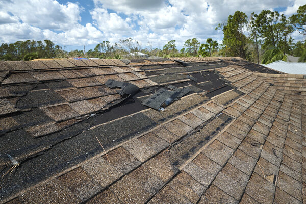 sun-damaged roof shows wear from sunlight sun-damaged roof shows wear from sunlight