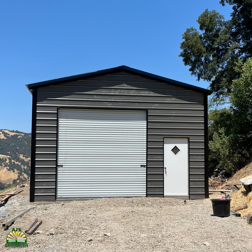 Steel carport protecting vineyard equipment in Napa County