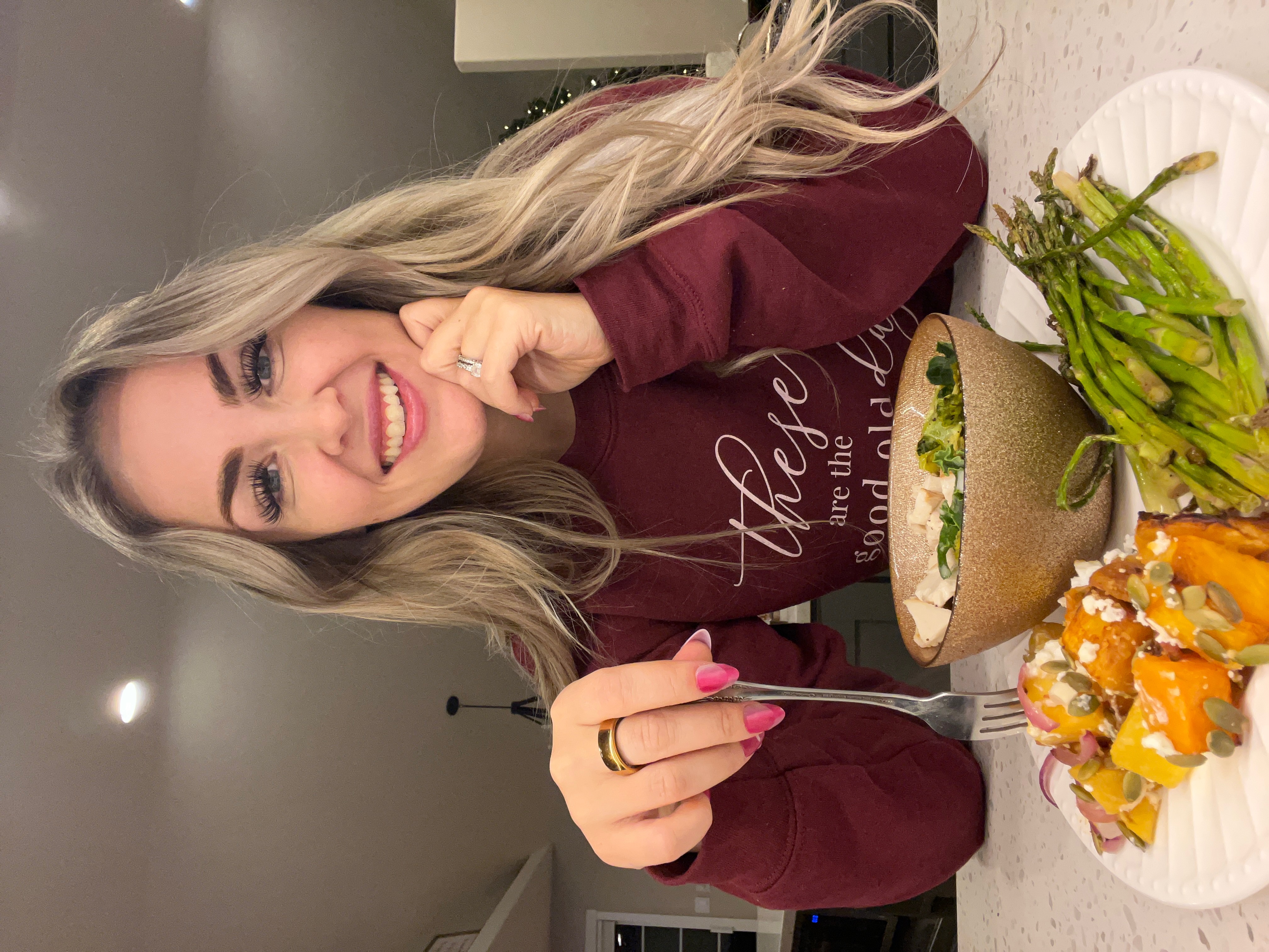 Stephanie Noble eating salad at table