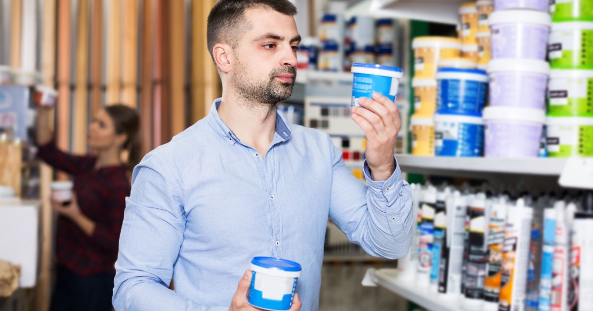 man holding a paint man holding a paint