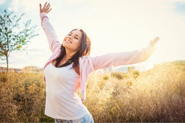 Woman feeling good outside high with dopamine Woman feeling good outside high with dopamine