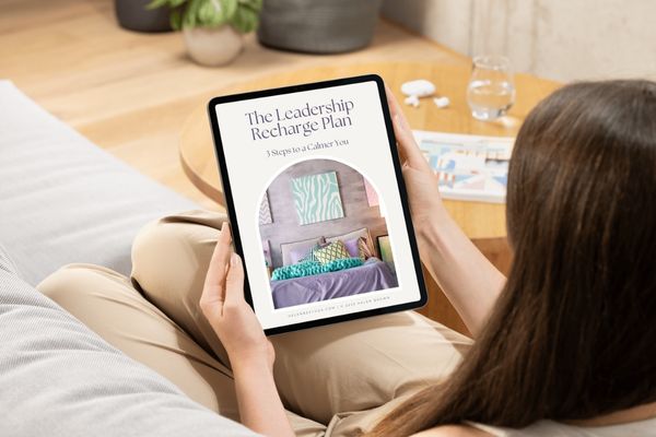 Woman reading the leadership recharge plan