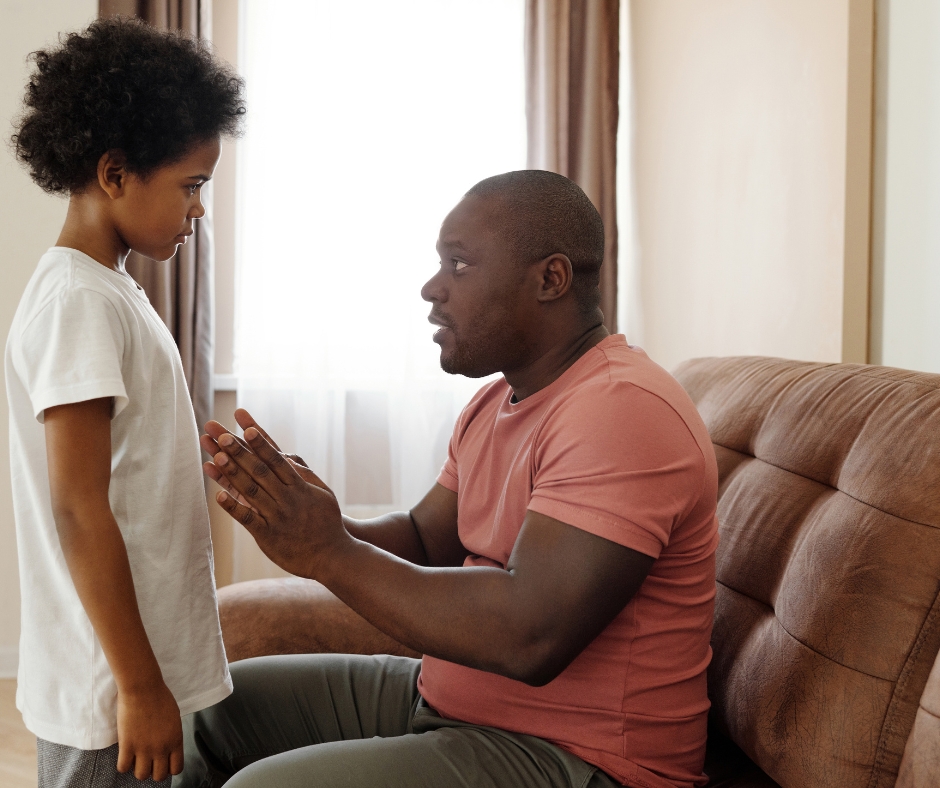 a parent talking to a child