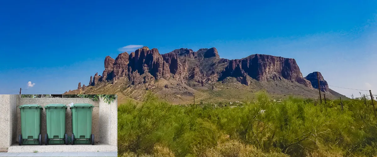 Three green trash bins overlaid on a scenic view of the Superstition Mountains in Apache Junction, Arizona 