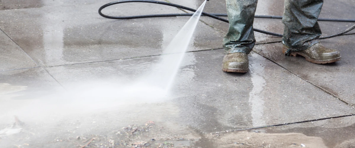 Professional pressure washing a driveway in Foothills Village AZ Professional pressure washing a driveway in Foothills Village AZ