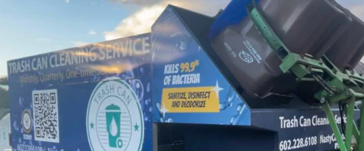 Trash can cleaning truck washing residential garbage bin with high-pressure system Trash can cleaning truck washing residential garbage bin with high-pressure system