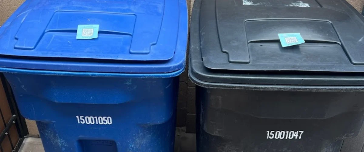 Close-up of clean blue trash can handle after sanitizing