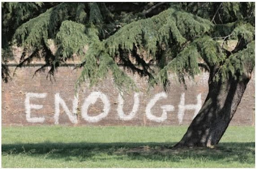 The word "Enough" boldly displayed, symbolizing contentment and the power of realizing abundance.
