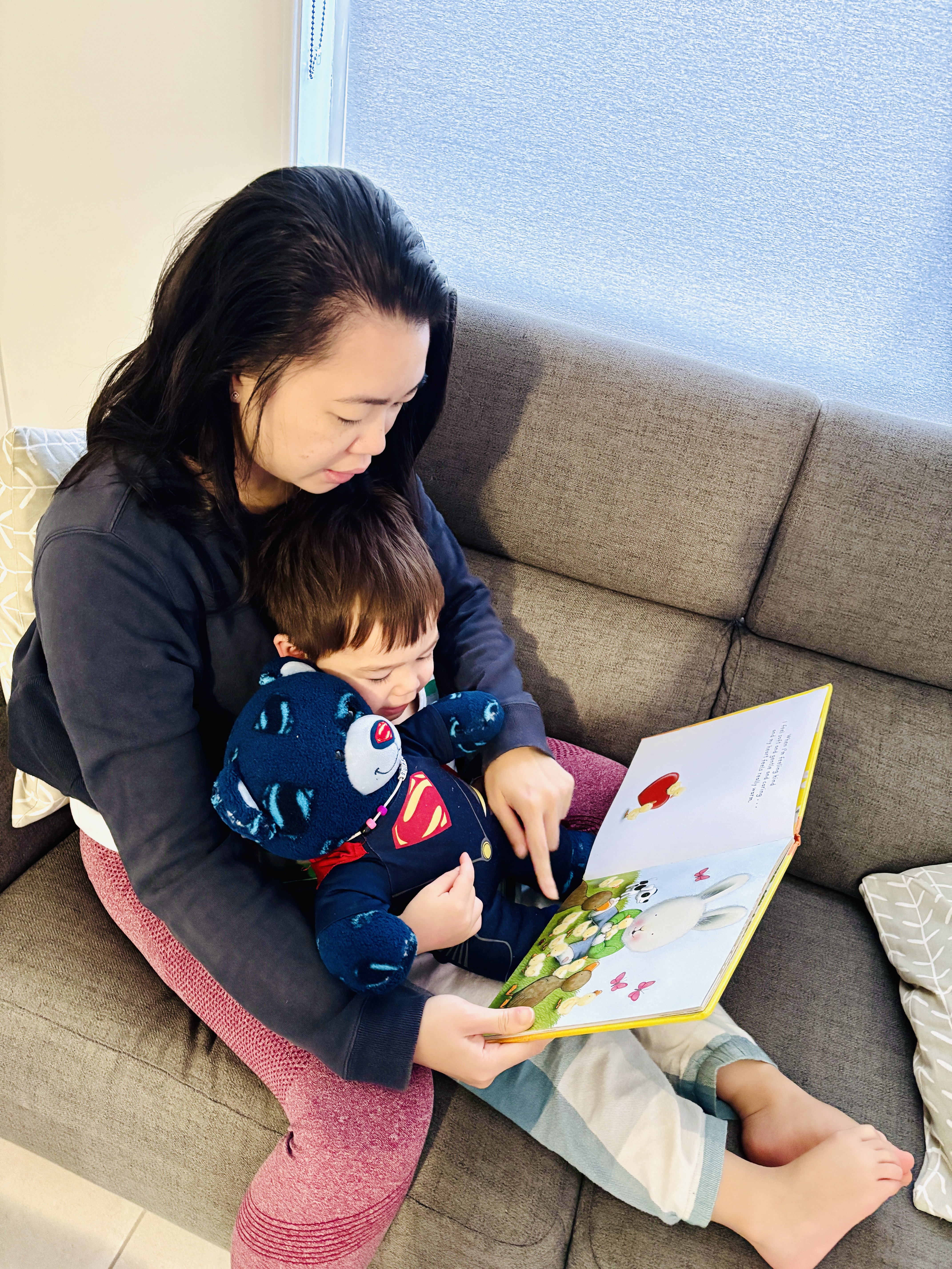 mother reading with child