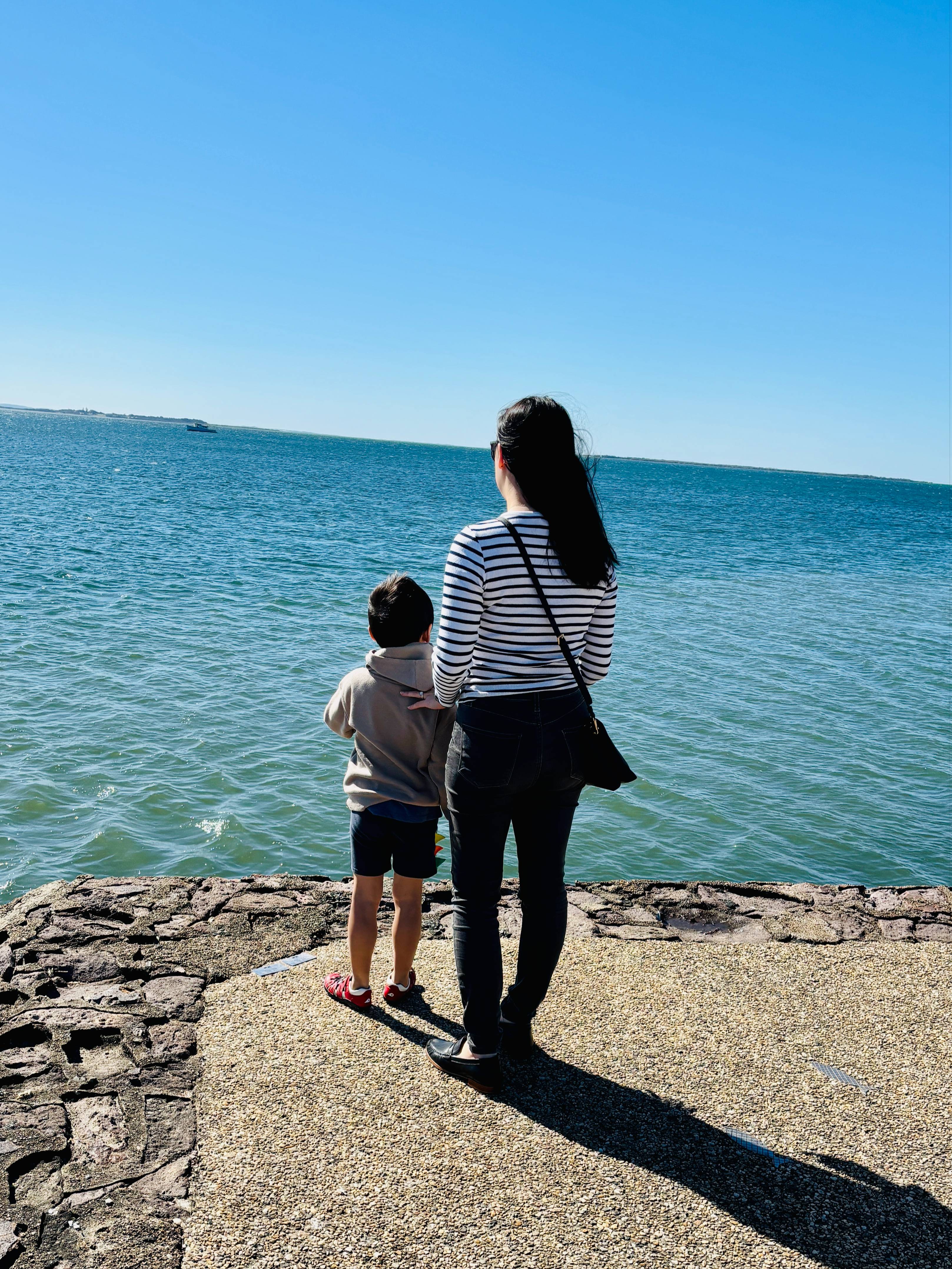 Mother and child standing together 