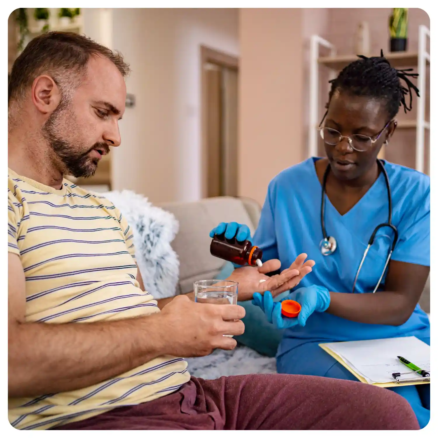 Professional caregiver providing medication management services for senior in Southern California home