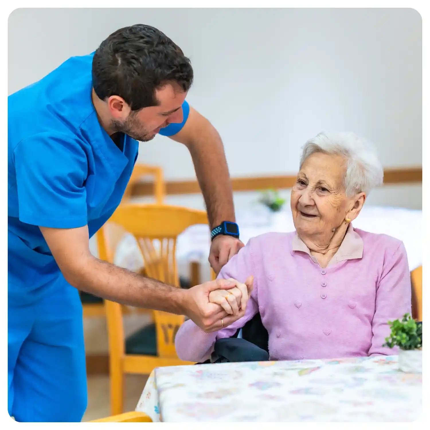 Compassionate caregiver assisting senior with personal care tasks in Southern California home setting