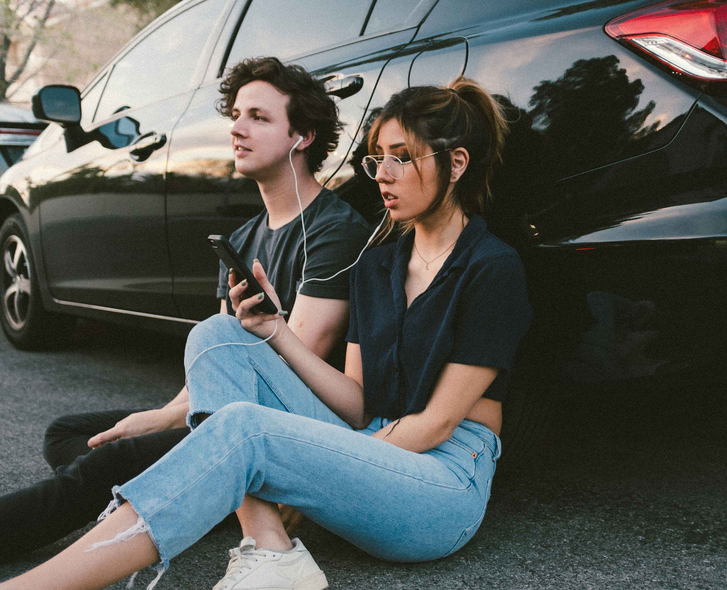 Listeners outdoors with headphones