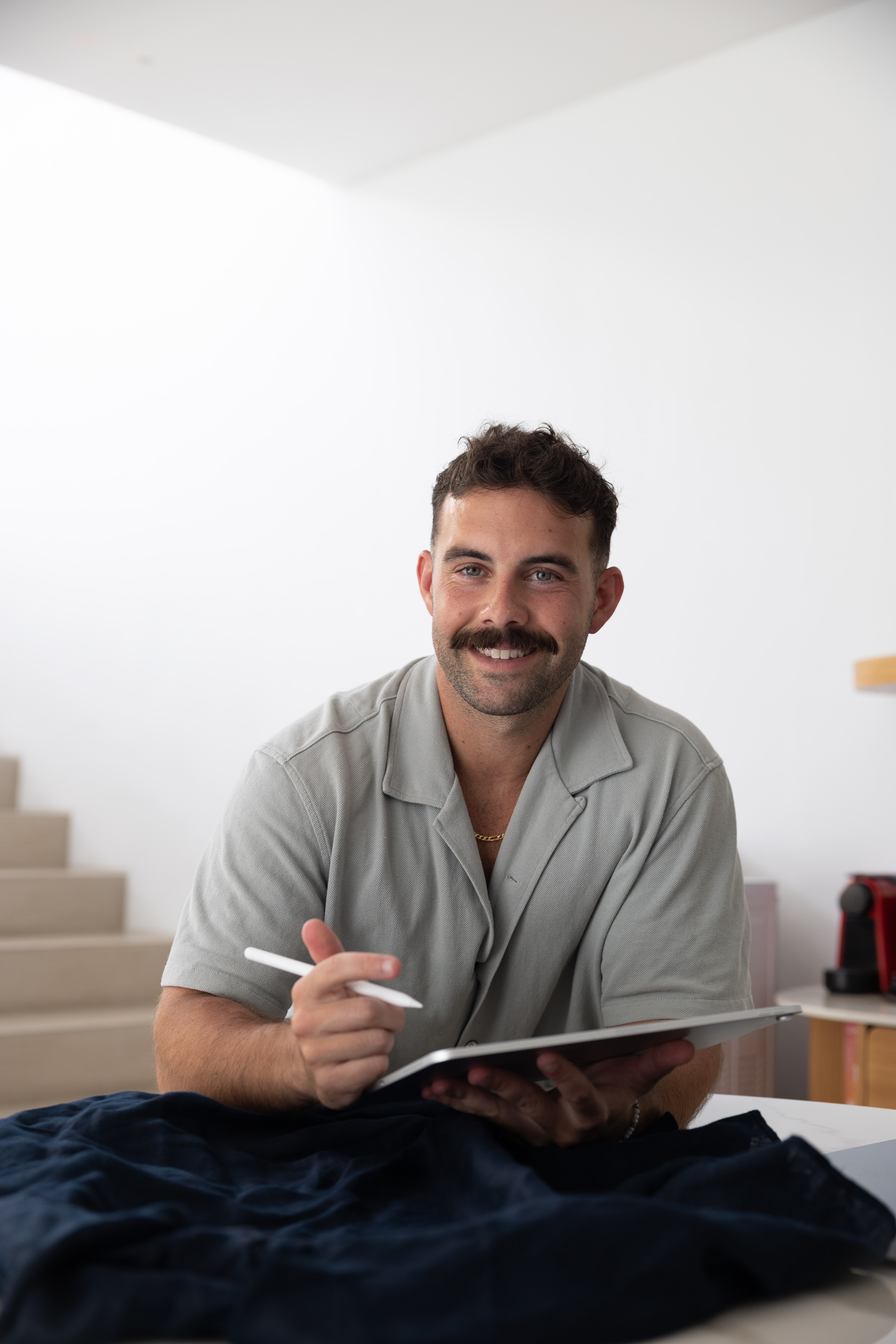 Joel Perna is the owner of luxury sleepwear brand Slouch Potato. 
Joel also runs a clothing brand consulting and mentorship program for businesses who are launching or scaling up their clothing brands.